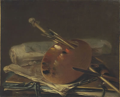 An artist's palette with brushes, a mahl stick, a knife, papers and portfolios