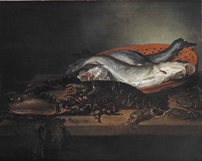 A black lobster, black crabs, three haddock in a red colander, all on a wooden ledge