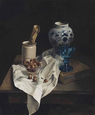 Still-life with hazelnuts in a glass