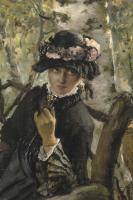 Femme assise dans un parc