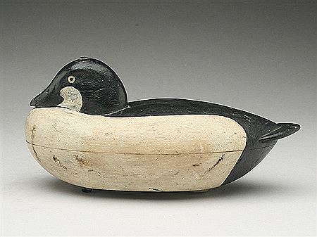 Important hollow carved goldeneye drake