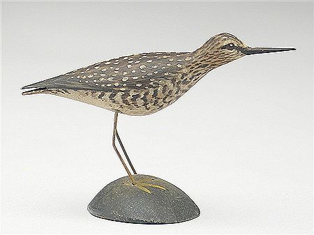 Miniature running yellowlegs