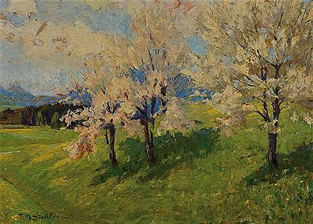 Apfelblüte in hügeliger Landschaft