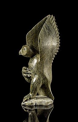 A serpentine carving of a bird with raised wings by Eyeetsiak Peter - Auction record, sale price, and art valuation. Compare with similar artists and explore comparable artworks.