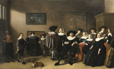 FAMILY PORTRAIT WITH HUSBAND, WIFE AND TWO DAUGHTERS SEATED AT A TABLE DRAPED IN RED CLOTH, A SON PLAYING A LUTE, ANOTHER SON HOLDING A FIDDLE BESIDE A LADY PLAYING THE VIRGINAL, A MAIDSERVANT POURING WINE BY THE WINDOW, AND A DOG RESTING ON THE FLOOR