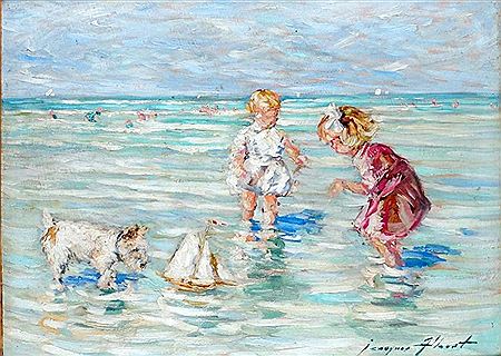 ENFANTS ET CHIEN JOUANT DANS LA MER AVEC UN BATEAU MINIATURE