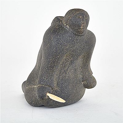 KNEELING FIGURE WITH KNIFE