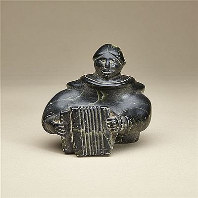 WOMAN PLAYING AN ACCORDION