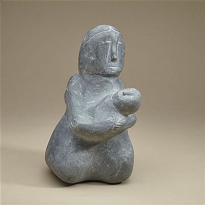 WOMAN CRADLING HER CHILD