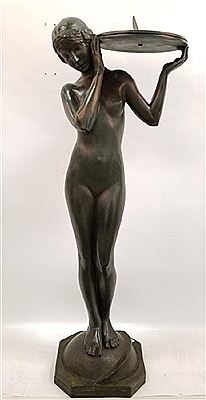 Art  Nouveau nude figure of a woman holding a sun  dial