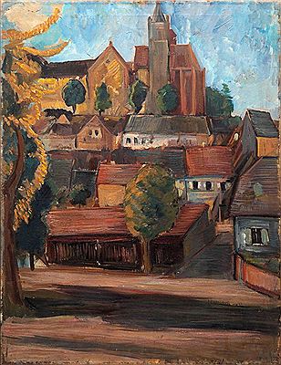 View over the houses of Breisach on the choir of the cathedral under a summery sky