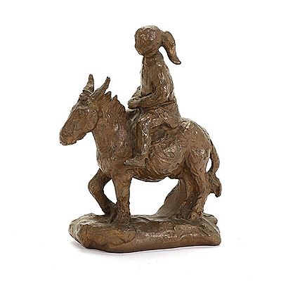 Girl on a donkey