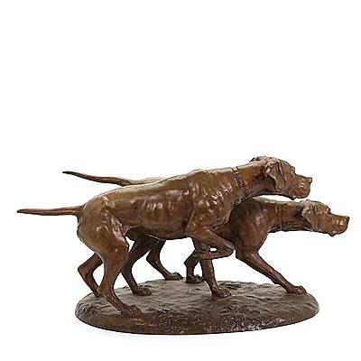A patinated bronze sculpture depicting two Pointers