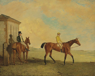 Souvenir with jockey up, with a trainer at Newmarket