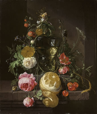 A flower garland around a berkemeier on a ledge