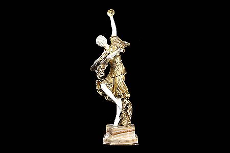 FIGURE OF DANCING GIRL WITH CYMBALS