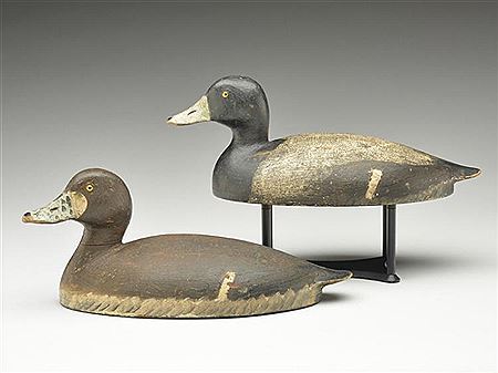 Pair of hollow carved bluebills