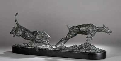 Lionne attaquant une gazelle