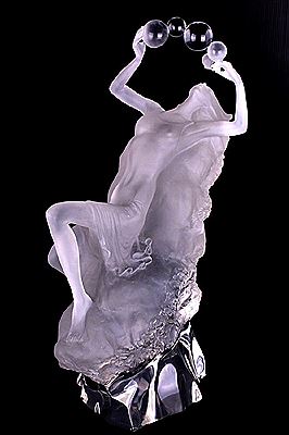 WOMAN BLOWING BUBBLES