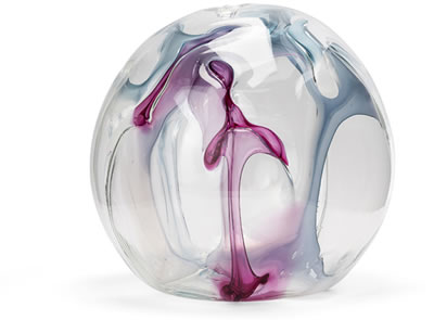 Clear sphere over multi-colored free-form elements
