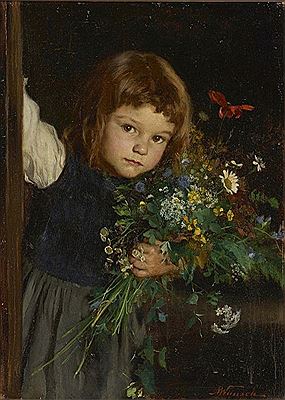 Little girl with wild flowers