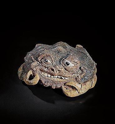 Colossal and extraordinary grotesque grinning crab