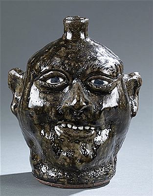 Stoneware Face Jug.