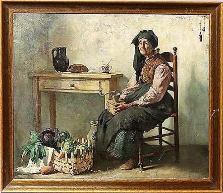 Frau an Küchentisch mit Kaffeemühle
