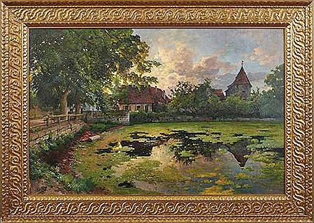 Teich in einem fränkischen Dorf im Abendlicht