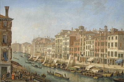 VENICE, VIEW ALONG A CANAL WITH GONDOLAS AND FIGURES AT A FISH MARKET