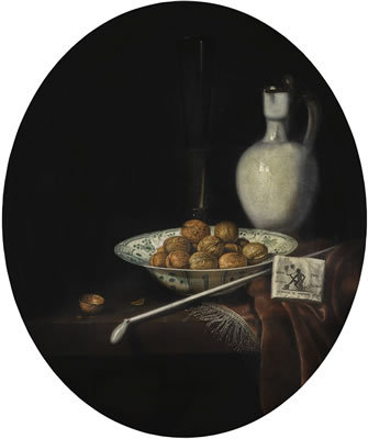 STILL LIFE OF WALNUTS IN A WAN-LI PORCELAIN BOWL, A GLAZED EARTHENWARE JUG, AND A PIPE AND SMOKING MATERIALS ON A PARTLY DRAPED TABLE