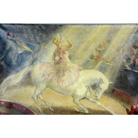 Woman on a white horse performing in a circus